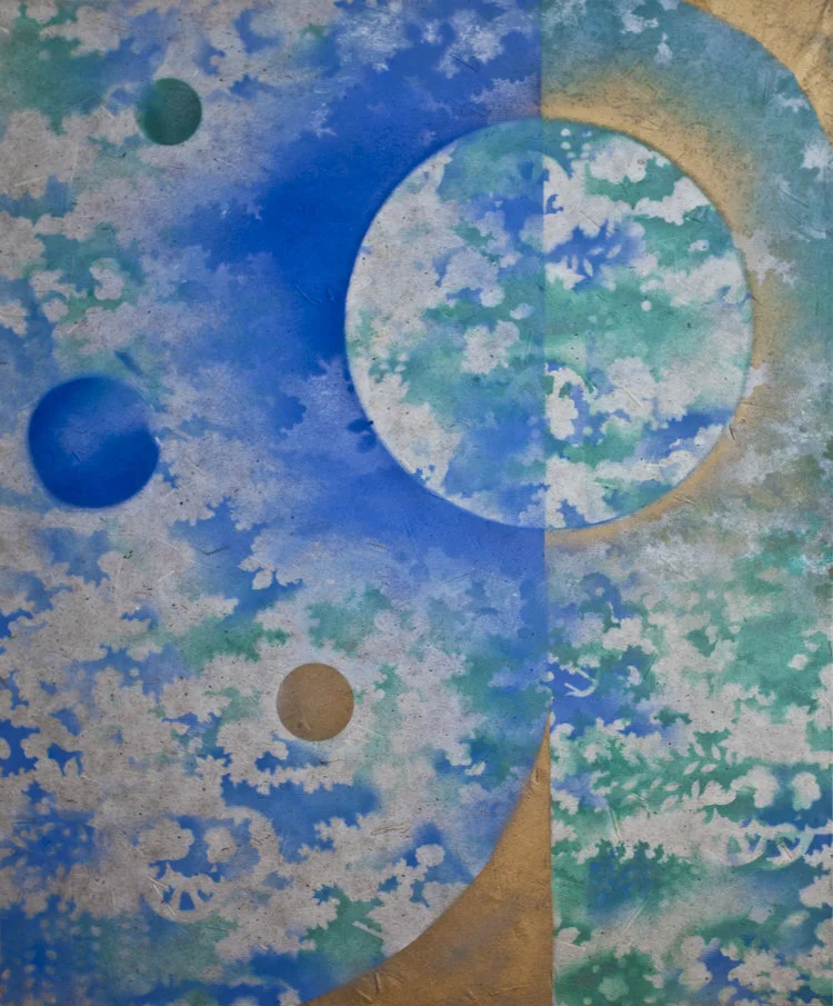 Water Planet (SOLD) , Oil Based Ink on Mulberry Paper Board Mount, 35 1/4” x 30 1/2” x 2 1/2”. Three moons with blue sky and gray clouds and green leaf-like background.