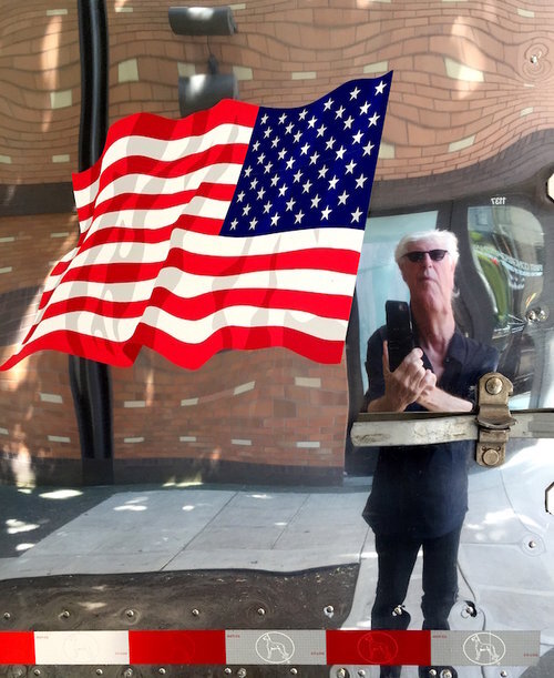 Self-Portrait with Flag, 2016, archival ink print on paper, 18" x 13.5”, Editions 20. Graham Nash looking in fun house mirror , American flag in foreground.