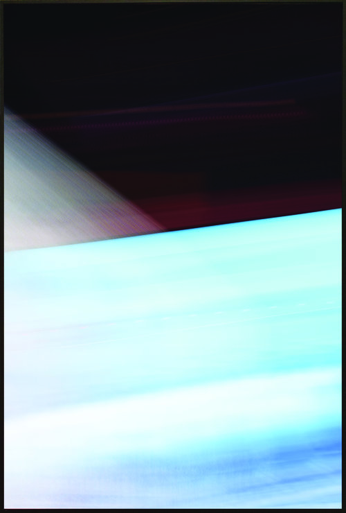 Colorfield vertical abstraction with blue and white in bottom half, black, gray and red in upper half.