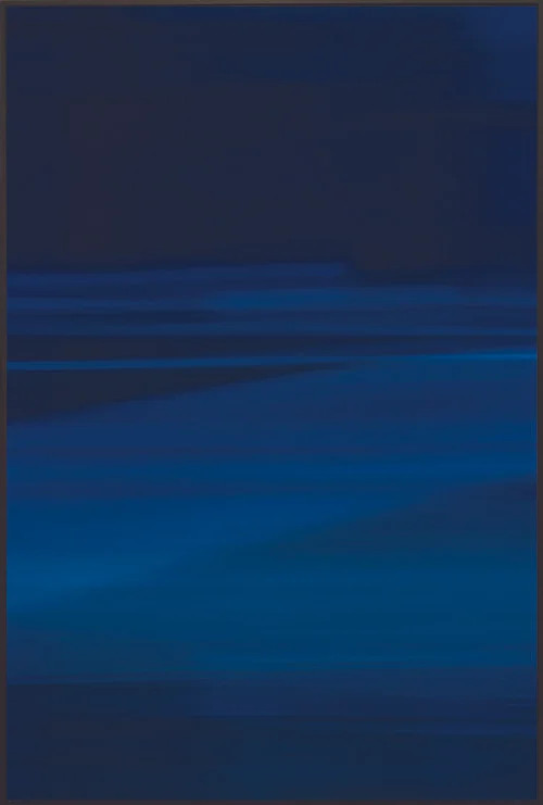 Colorfield vertical abstraction seascape in blue in bottom half, navy in upper half.