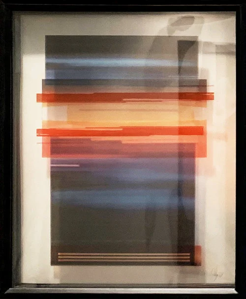 Colorfield abstraction of photographic collage with transparent layers. black, blue, red, orange rectangles overlapping on yellowish white background.