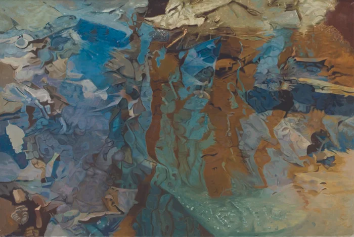 monochromatic reflected stream pool in blue with shimmering tree reflections in brown