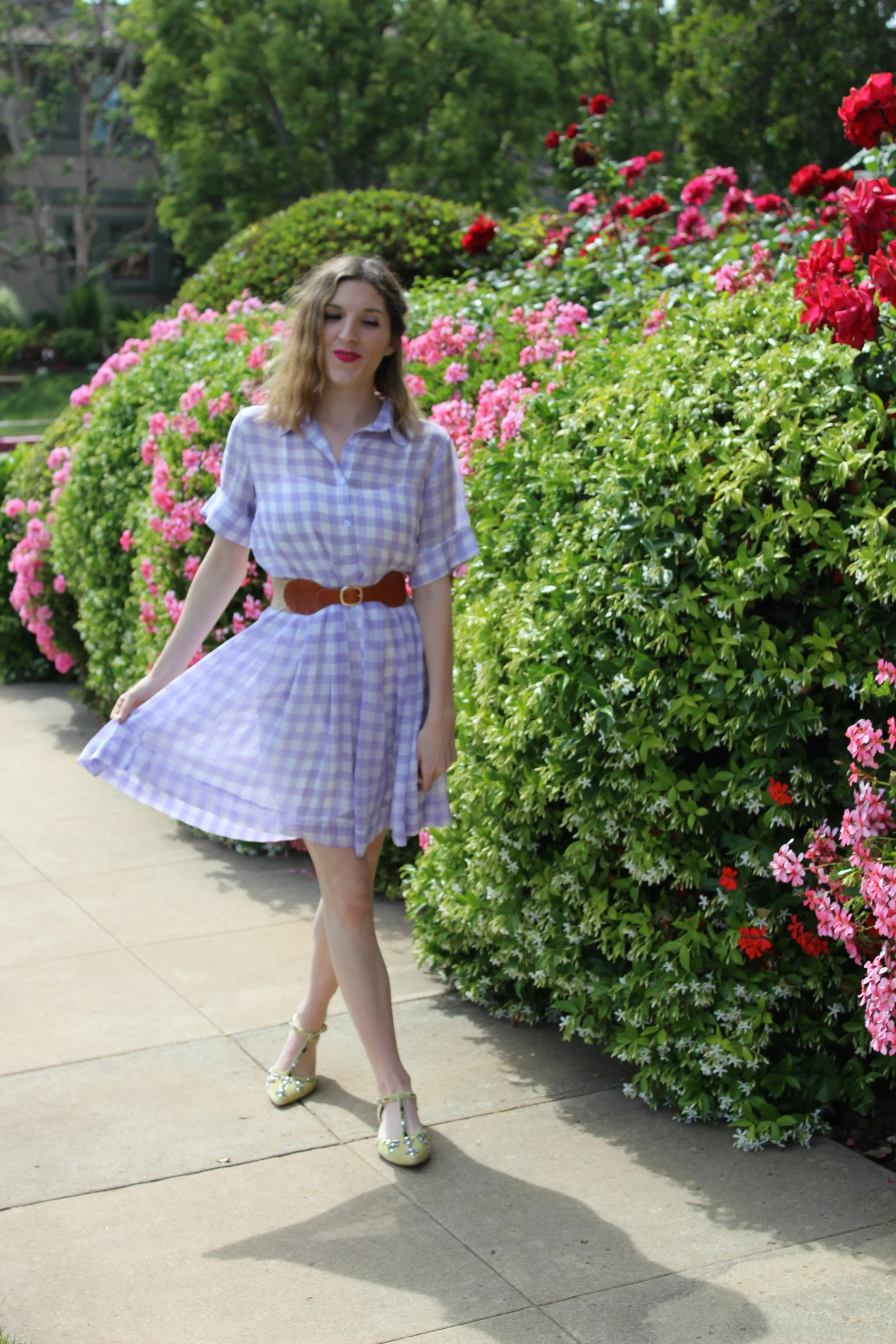 I love the breeziness of this dress. It is an almost gauze like material. It's very soft and easy to wear. It is a little oversized so I had to belt it but I think the brown weaving of this belt added to dress actually!