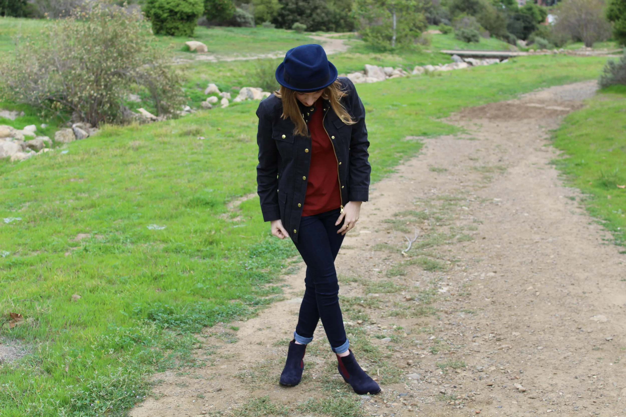 For me, the hat and the shoes are what really tied this look together. The shoes have both navy and red in them which paired great with the jeans and top combo. The jacket is also a dark navy which was perfect, because it was a little rainy this day.