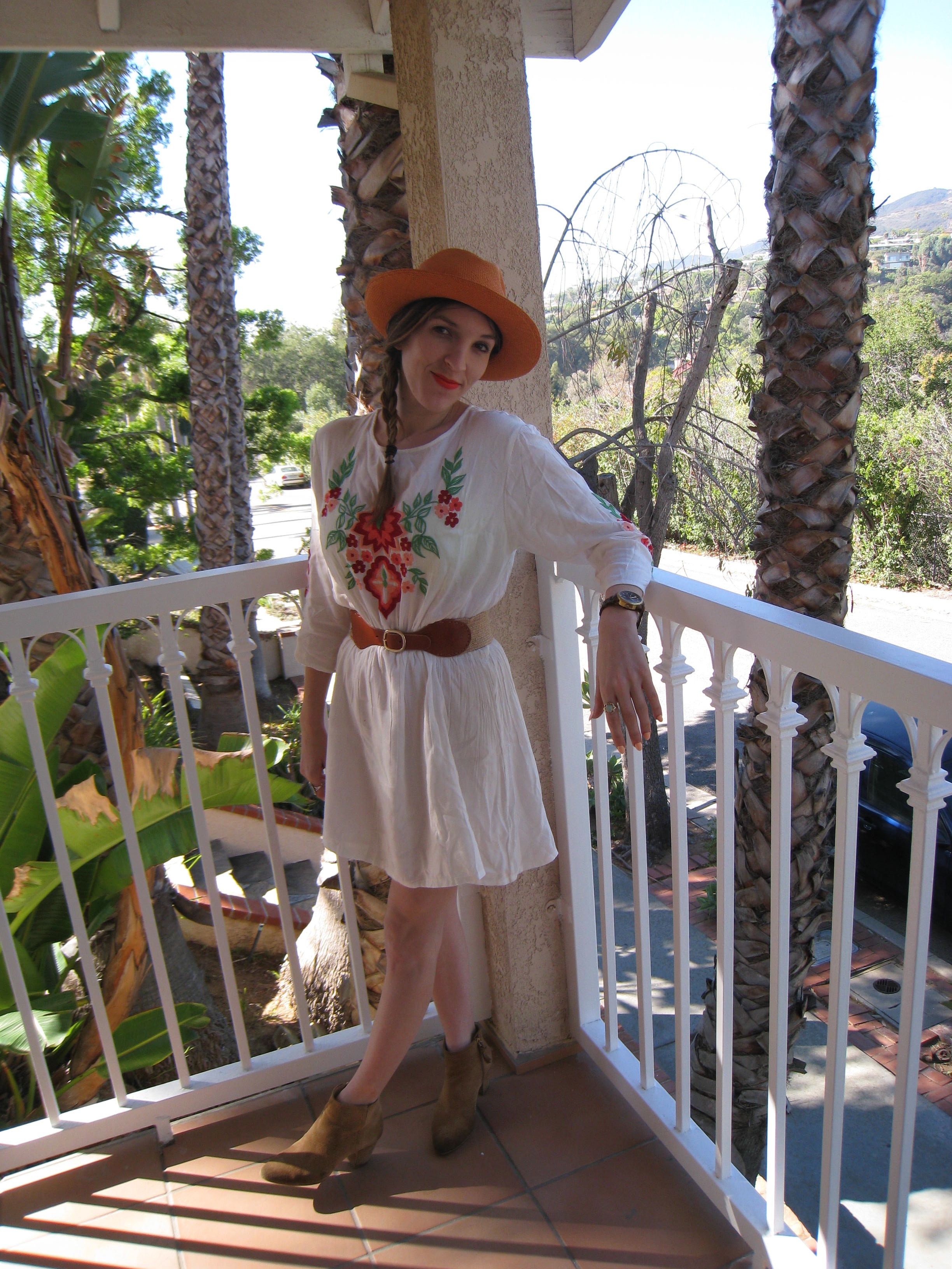 Dress: Boohoo, similar here , here , and here // Belt: Banana Republic, similar here // Boots: Banana Republic, similar here // Hat: From Panama, similar here I am an absolute die hard fan when it comes to embroidery. Even more so when that embroidery includes flowers! I love embroidery because it always add a unique and fancy feel to whatever it is put upon. It also usually involves a bright amount of color which really draws me in as well since I am a huge advocate of color. Embroidery is perfect for the summer time because it makes a simple dress like this white one really pop! Pairing this look with a cute summer hat and little booties, you'll be ready to hit the streets. You can even take this look from day to night. It is an effortlessly cool look that has just the right amount of pizzaz and pop to make it a fashion success! Try this look and I am sure it will not disappoint! Thanks for stopping by and keep following for more new looks! Ciao!!! xx Nicole