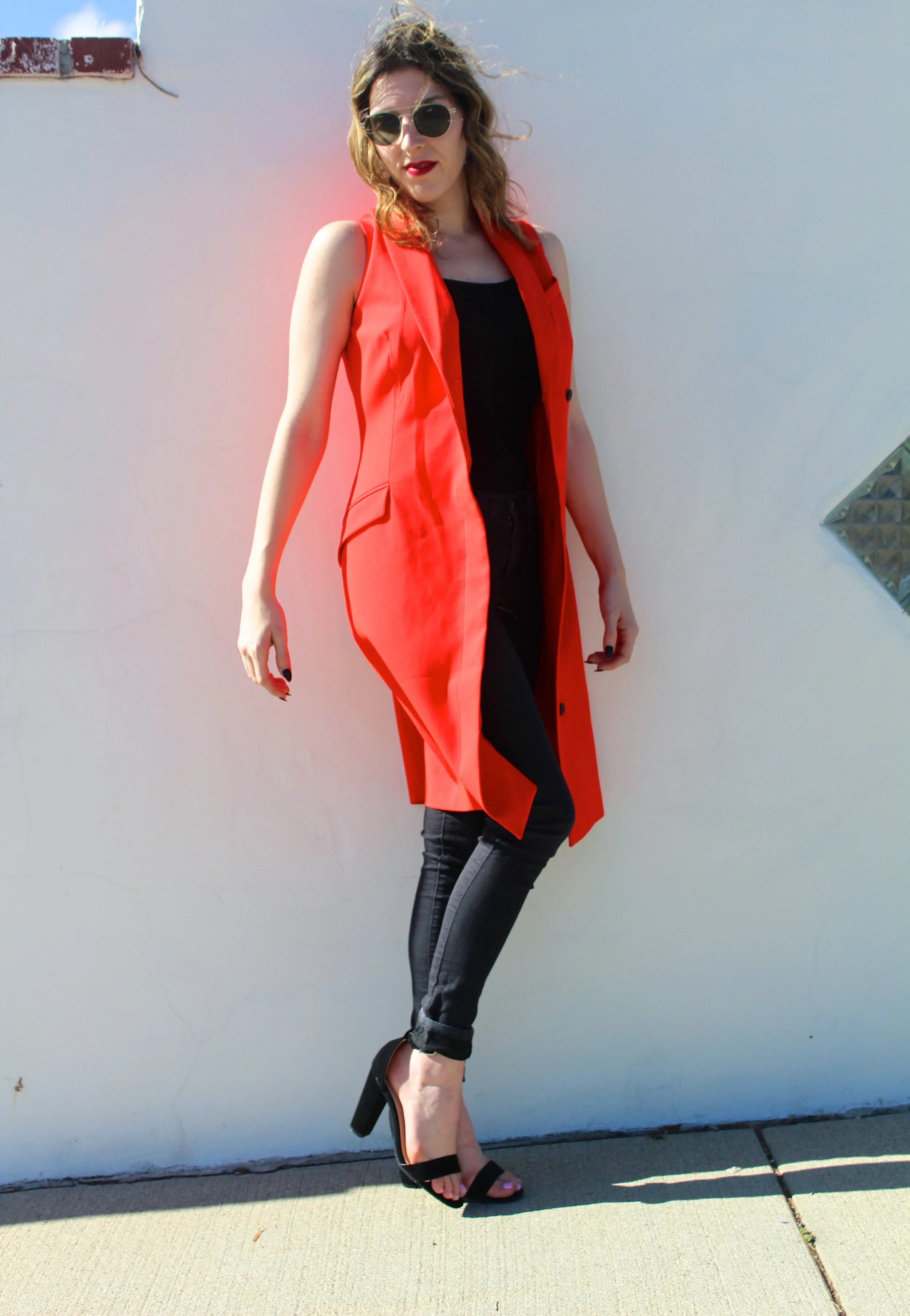 Vest: Banana Republic, similar here // Top: old, similar here // Denim: Flying Monkey // Shoes: Bamboo // Sunnies: Le Specs Happy first day of November! This year has flown by so fast! I am very excited for the upcoming holidays we get to look forward to! This is an easy look mixed with bright red and the easiness of all black. It is a minimal look that looks very edgy! I love this look! Enjoy! Thanks for stopping by! xx Nicole