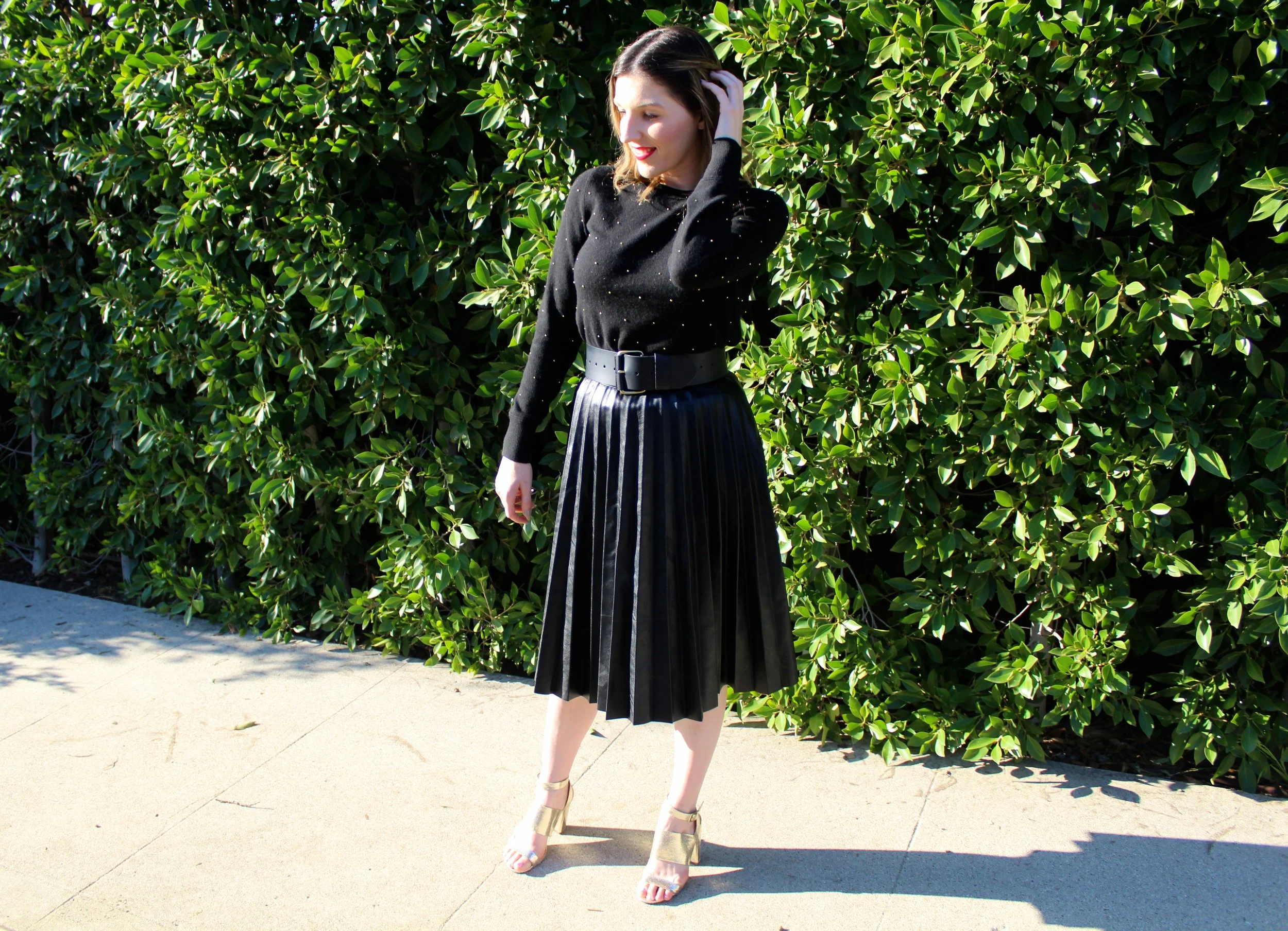 Sweater: Banana Republic // Skirt: Shein // Belt: Banana Republic, similar here // Shoes: Forever21, similar here I just love a black leather skirt for the holidays! Its versatility allows me to pair it with many festive prints for whatever the occasion, from casual to fancy. It is definitely a must have for the holiday season closet collection. One of the important things to look for in a leather skirt is the wearability. The better the faux leather, the longer the skirt will be around for those fall/winter get togethers! You can find this skirt and more like it at Shein.com, and the best part is it is less than $15! Wowza!!! Their website will help you pick the style and size that will definitely make you a hit under the mistletoe. As you can see, this is one of my favorite holiday looks and now one of my favorite shopping sites! They always have a great variety of what I am looking for! And because their prices are so affordable, I can often get something else for the same price as one item on another site. That is the best! Score! So whether you're looking for that perfect leather skirt or another stunning look this holiday season, Shein is where it is at! I highly recommend their site and I bet you won't be able to leave it without buying something! 