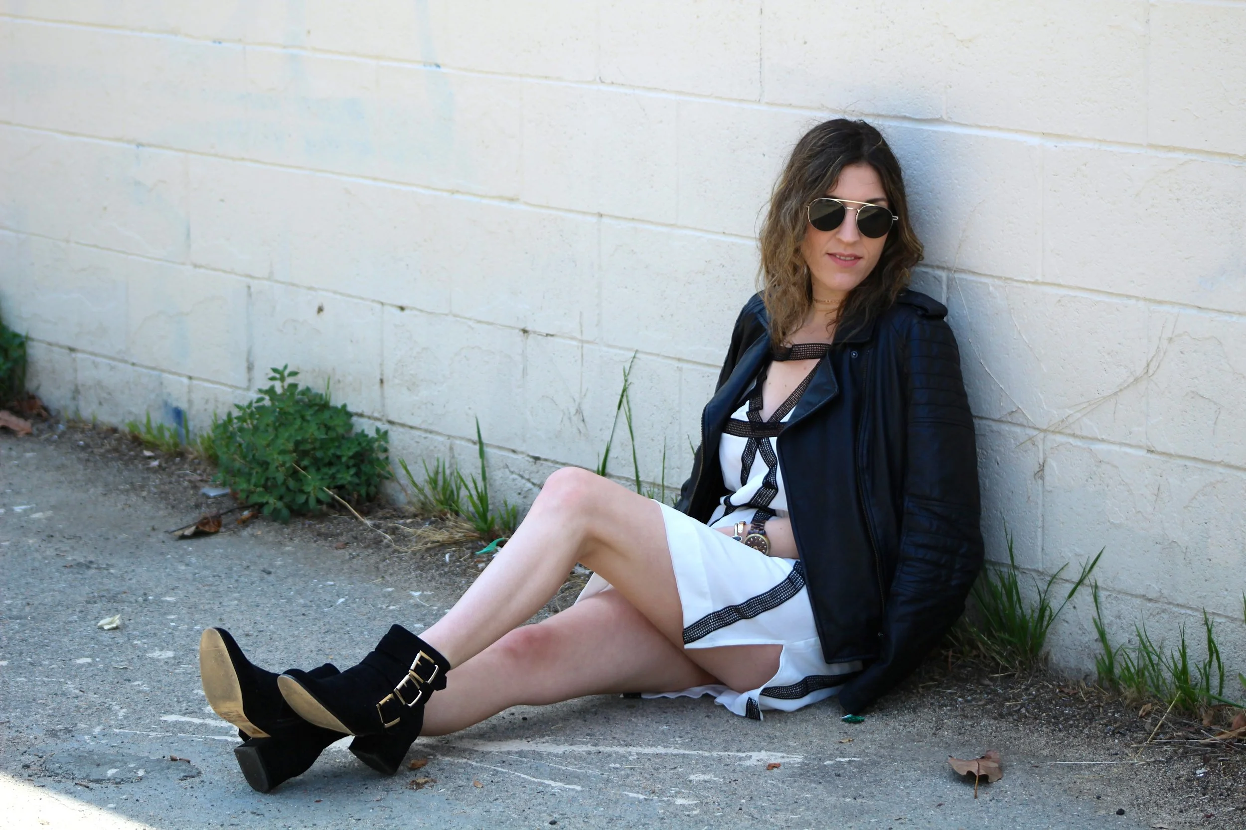 Dress: Suboo, similar here // Boots : F21, similar here // Jacket : Banana Republic, similar here // Sunnies : Le Specs // Necklaces : F21 I celebrated my birthday this past Monday and had a heck of a time! First thing on the itinerary of the days events was heading to Alfred's Tea Room in Beverly Hills and grabbing a drink. I ordered the rose milk tea with boba and was not disappointed! I have been drinking rose everything! Next up was being a tourist in my own city! A friend and I went to all the different "famous" walls we could in West Hollywood and Beverly Hills. It was fun because we had both never been and got to explore the city we call home. After that we headed to the Beverly Hills Hotel to grab lunch by the pool. The Cabana Cafe is so beautiful and the food is amazing! If you are looking to eat cheap, this is not the place to go. Just a salad will cost you $45 or more. The days events ended with having dinner and cake ( princess cake to be exact- my all time favorite), with family and then drinks at Tiki No in North Hollywood that night. The whole day was incredibly fun and filled with lots of laughter and love. I also enjoyed that I got to roam all around LA, trying and exploring new tastes and sights! Now about the outfit. I love this dress. It is actually very old, but I had never worn it. I found it shoved in the back of my closet with the tags still attached. Whoops! Has this ever happened to you? I love the black and white combo and the crochet cut out and detailing throughout the whole thing. It made me feel extremely sexy while wearing it. I threw on my favorite leather moto jacket and some fun black ankle boots for a day of birthday festivities! Until next year..... Have a great day! xoxo! ~ Nicole