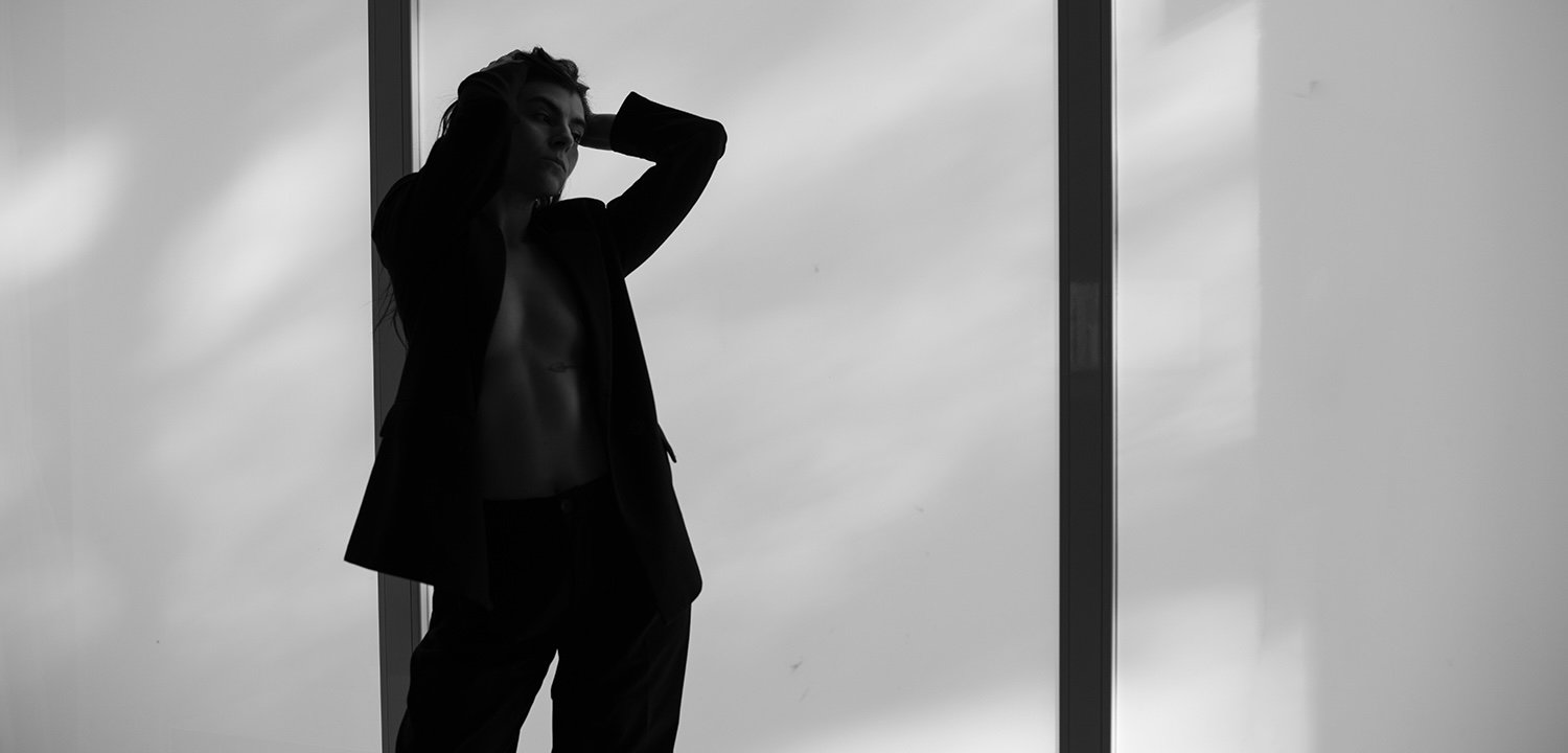 Comfortable in a suit, uncomfortable in her own skin
