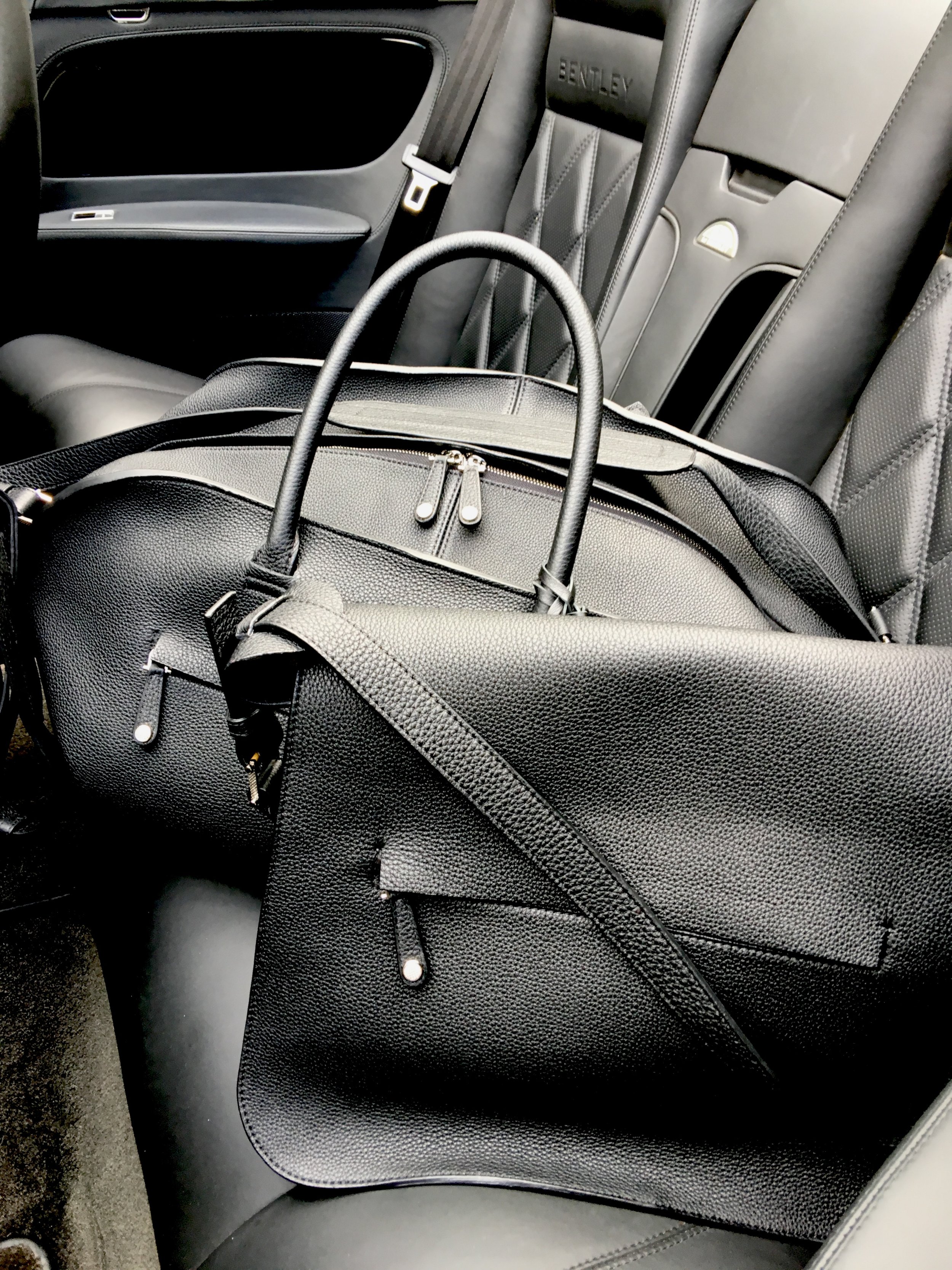 GREY NEW ENGLAND DUFFEL AND MESSENGER LIFESTYLE 1.JPG