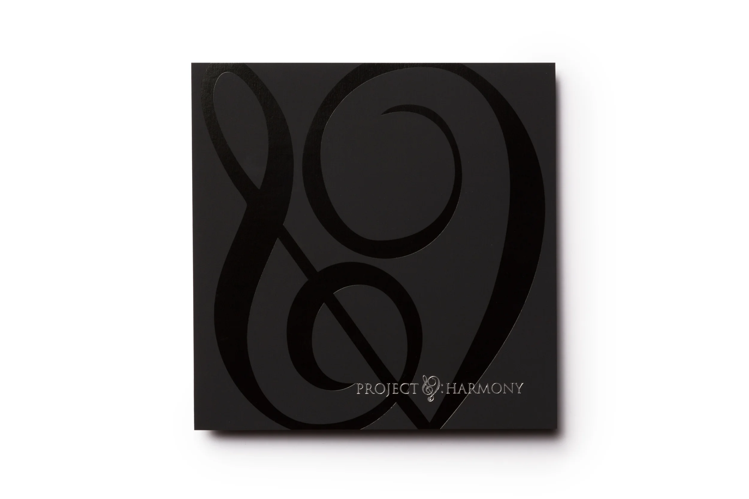   Harmony created with the use of black foil stamping on black Touché stock, with silver foil enhancing it even more.&nbsp;  