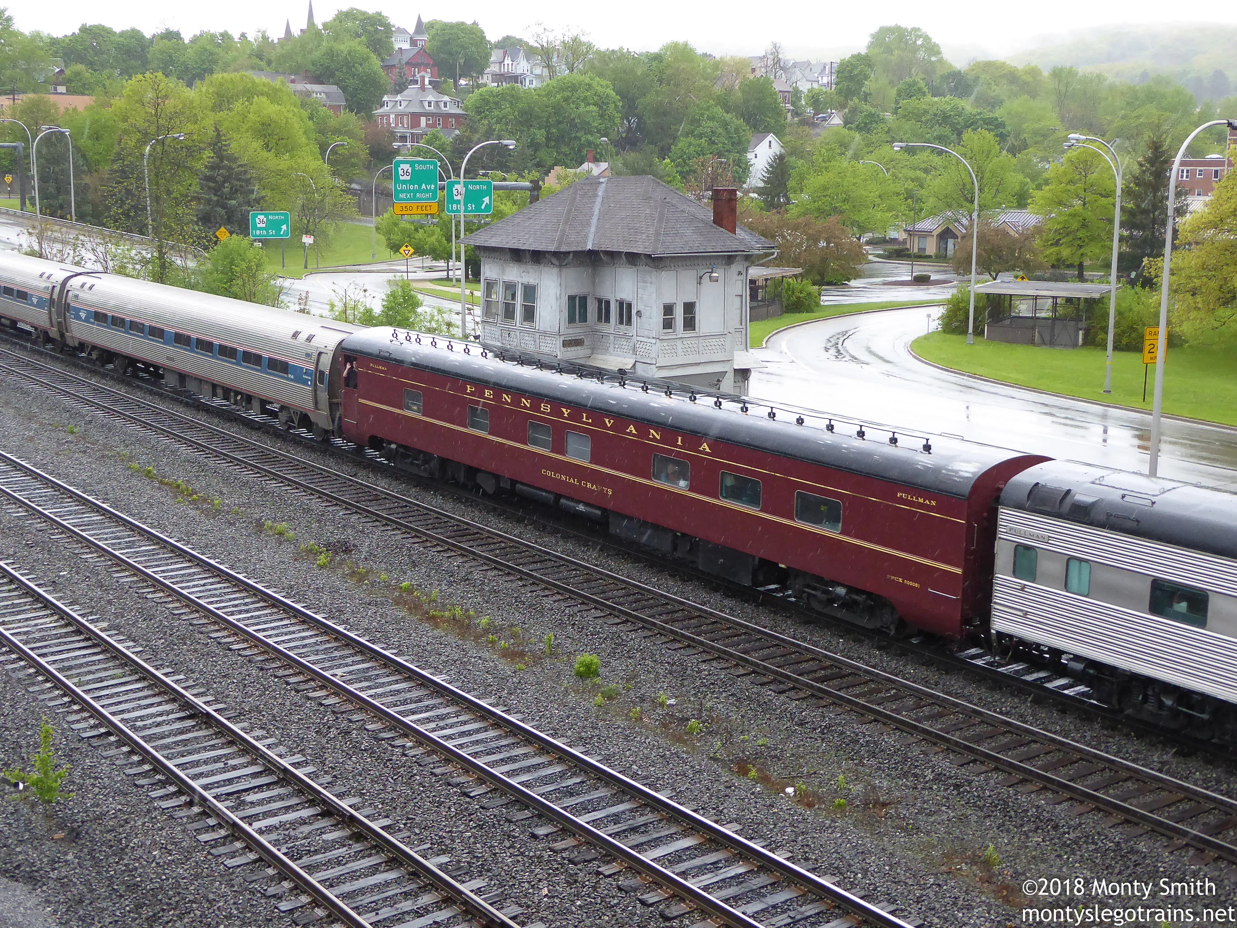 ex-PRR "Colonial Crafts" passes by ex-PRR Alto Tower on ex-PRR rails in an ex-PRR town.