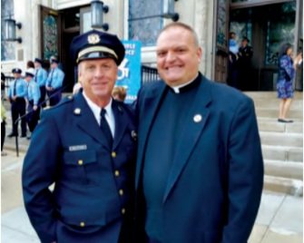  Captain John Wilczynski of the Philadelphia Police Department and Rev. Steve Wetzel, OSFS, Chaplain to the members of the police department. 