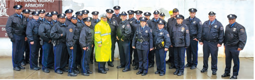  Rev. Steve Wetzel, OSFS, (Back row fourth from right) stands with members of the Philadelphia Police Department, whom he serves as chaplain for the Michael the Archangel Ministry Program. 