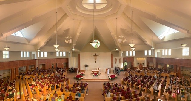 Fr. Ed Ogden, OSFS, celebrating mass for the Feast Day  with the children of Christ the Teacher Regional School