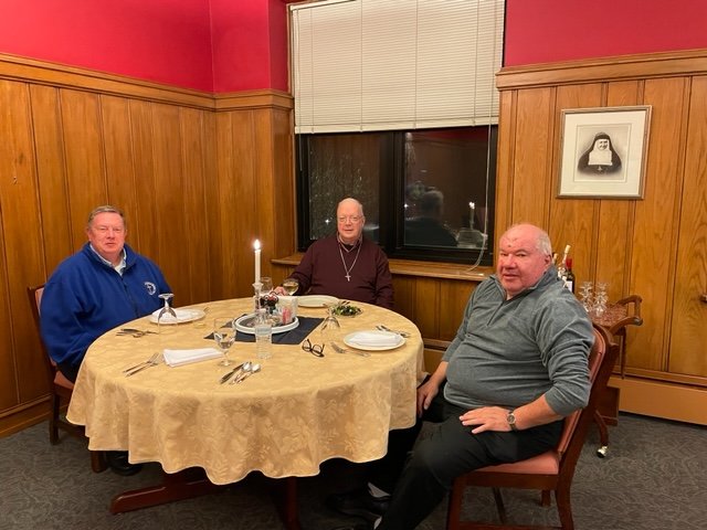 Fr. Steve Shott, Fr. Michael Connolly and Fr. Joseph Morrissey celebrate the feast of St. Francis at the Salesianum Residence