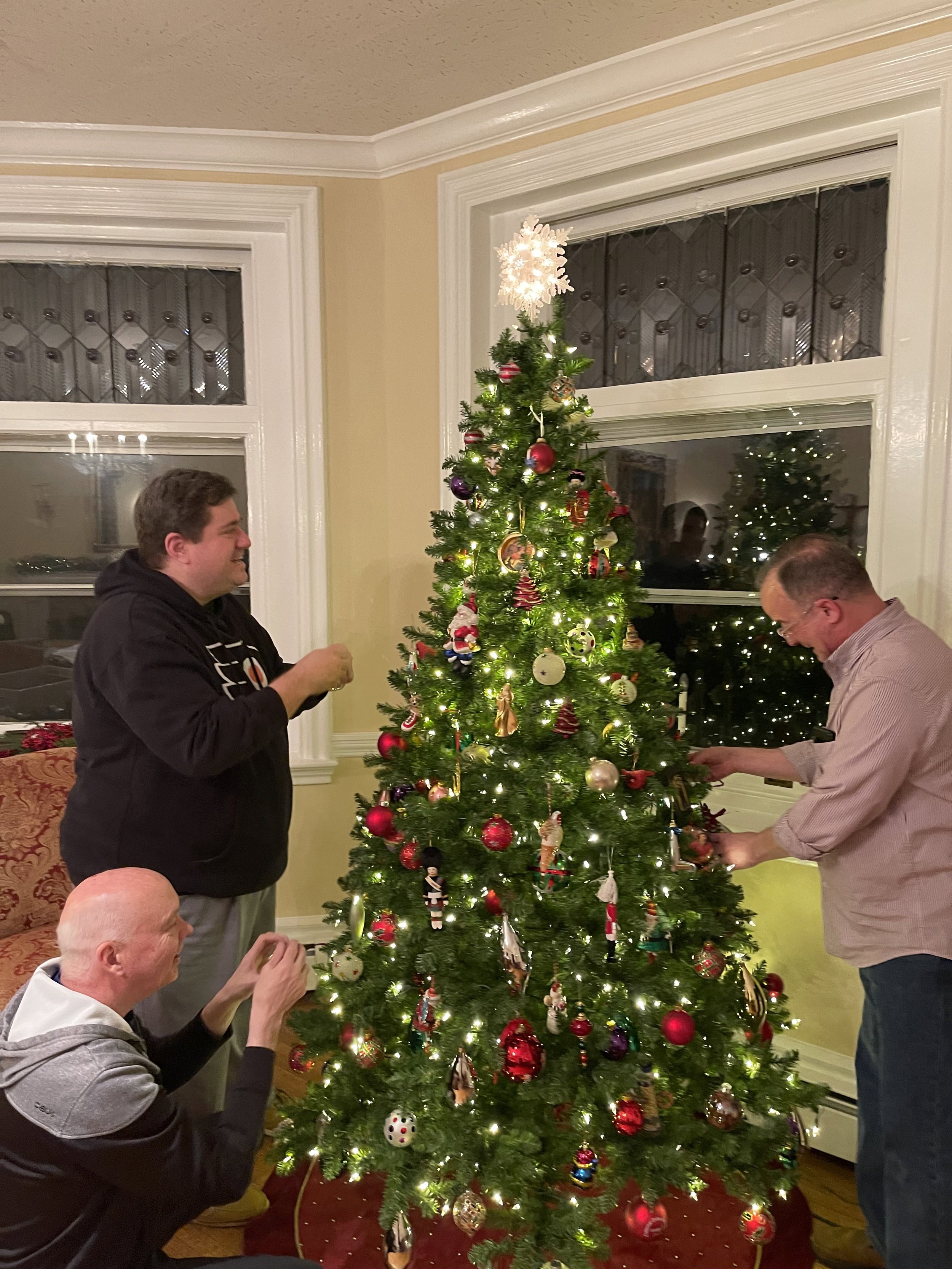  Oblates Fathers Jack Kolodziej, Edward Ogden and Bob Bazzoli decorated their Christmas tree. 