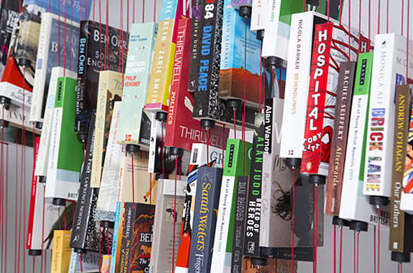 Books hanging on strings