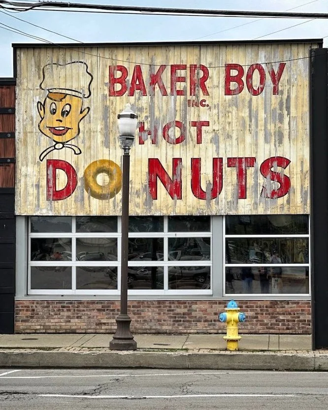 Another vintage storefront with a killer sign... And a business model I’d love to breathe new life into. 🍩✨ If I had a donut shop, the menu would start with chocolate chip donuts (non-negotiable) and great coffee. Could it grow into a brand as