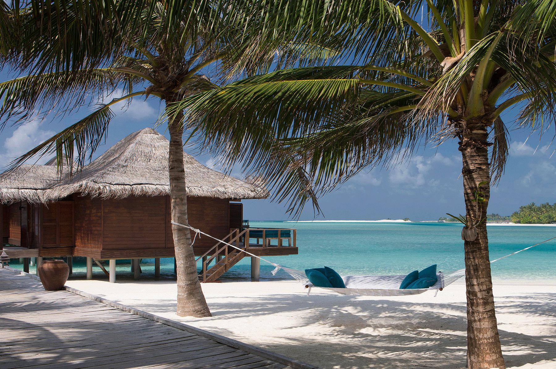 61912005-H1-Boardwalk_from_beach_to_Over_Water_Bungalows-copy.png
