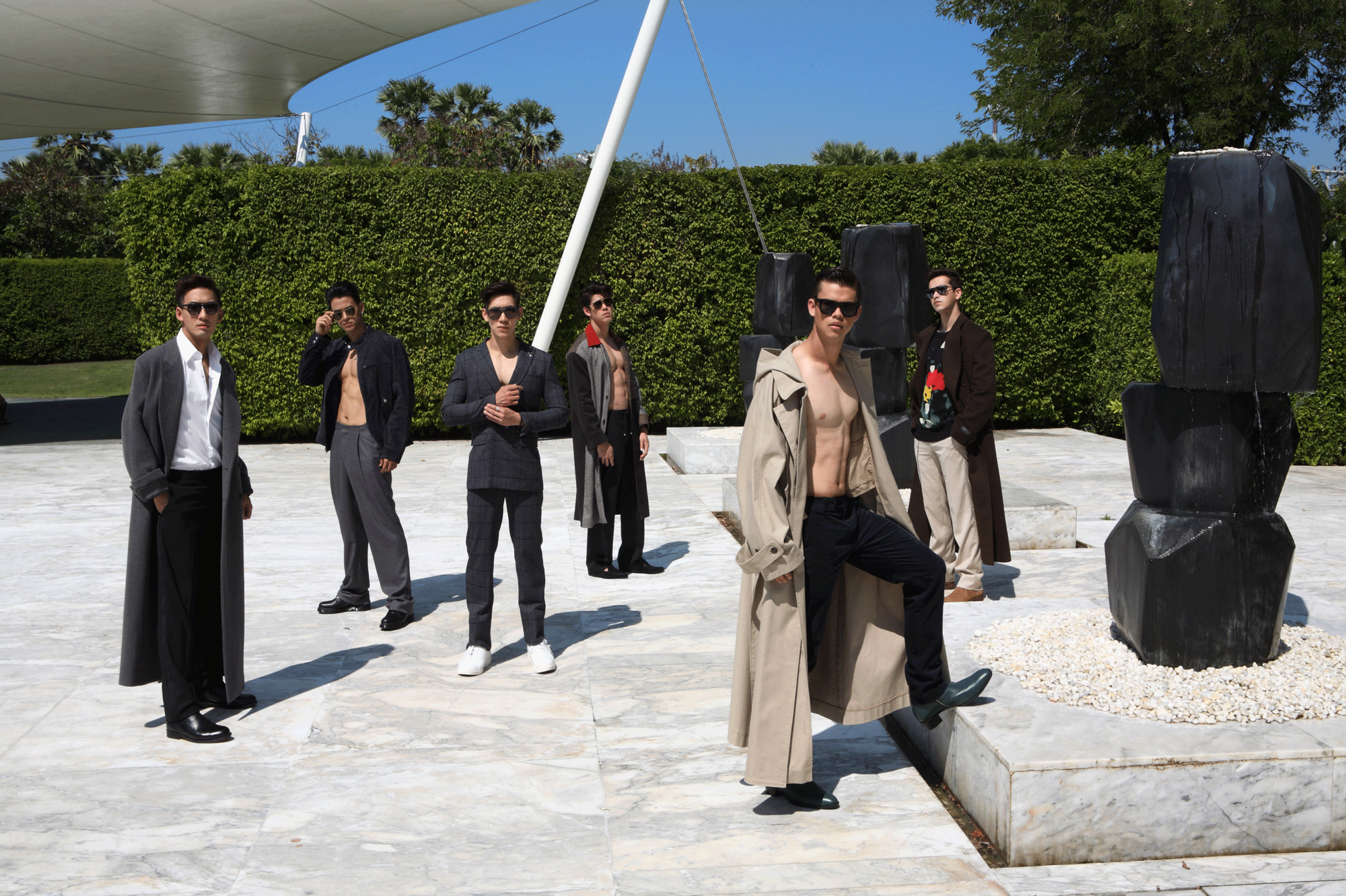 from left to right Bom : shirt : P.MITH / pants : Brooks Brothers / coat : Balenciaga at Wild Icon Film : jacket : Brooks Brothers / pants : P.MITH / shoes : London Brown Poppy : Suit and pants : P.MITH / shoes : London Brown Pon : Coat : Leisure Projects / pants : P.MITH / shoes : London Brown Kim : coat : Everyday Karmakamet / pants : Brooks Brothers / shoes : Rich Cast of Characters Paul : coat : Balenciaga at Wild Iconic / sweater : Everyday Karmakamet / pants : P.MITH all sunglasses : Blake Kuwahara