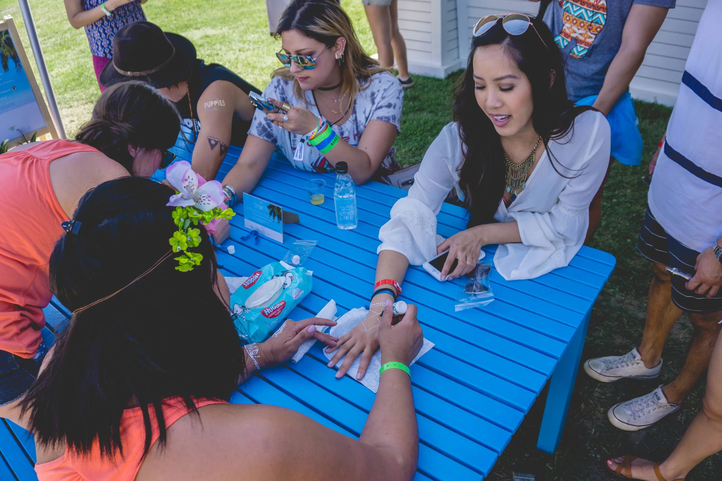 Trisha taking advantage of the free white henna station.