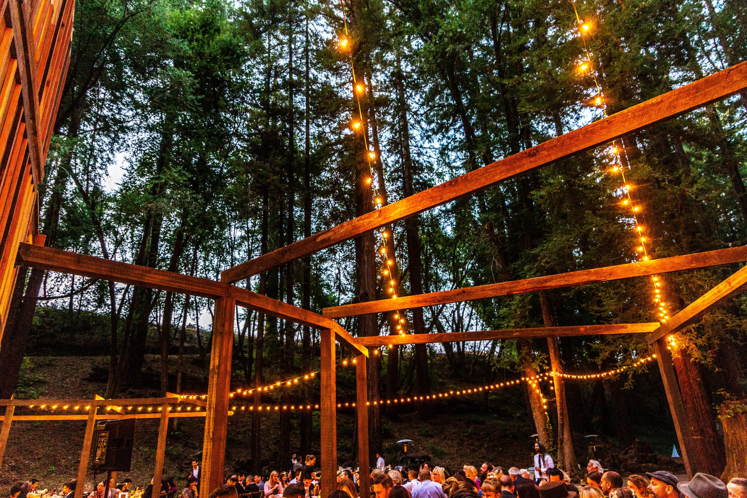 The illuminated structure of the Redwood Pavilion at The Brambles in Philo, Anderson Valley, California