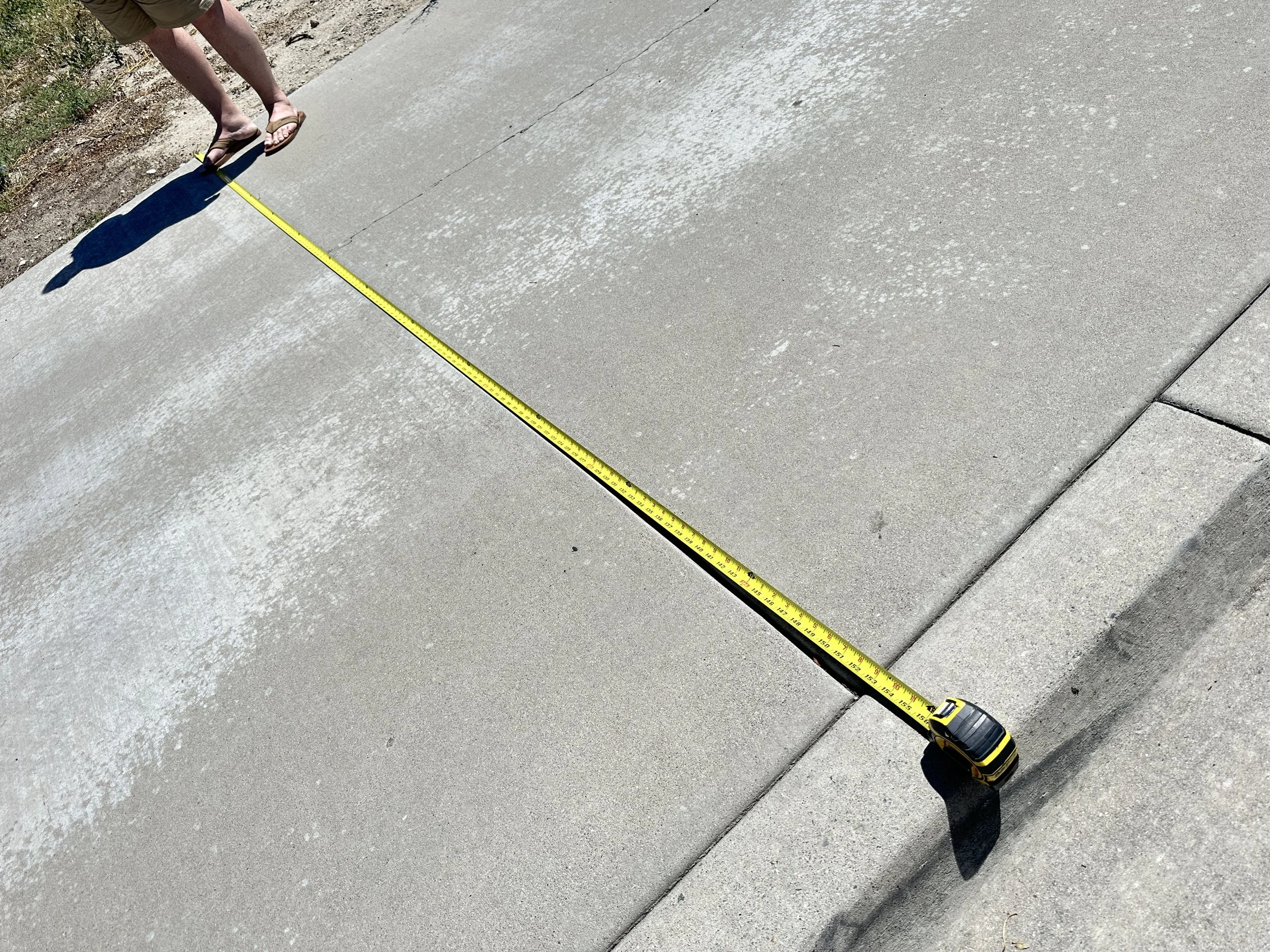 This shows that the sidewalk itself is just under 13 feet wide