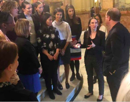 Executive Director Sherry Lachman introduces Governor Jared Polis to the Foster America fellows