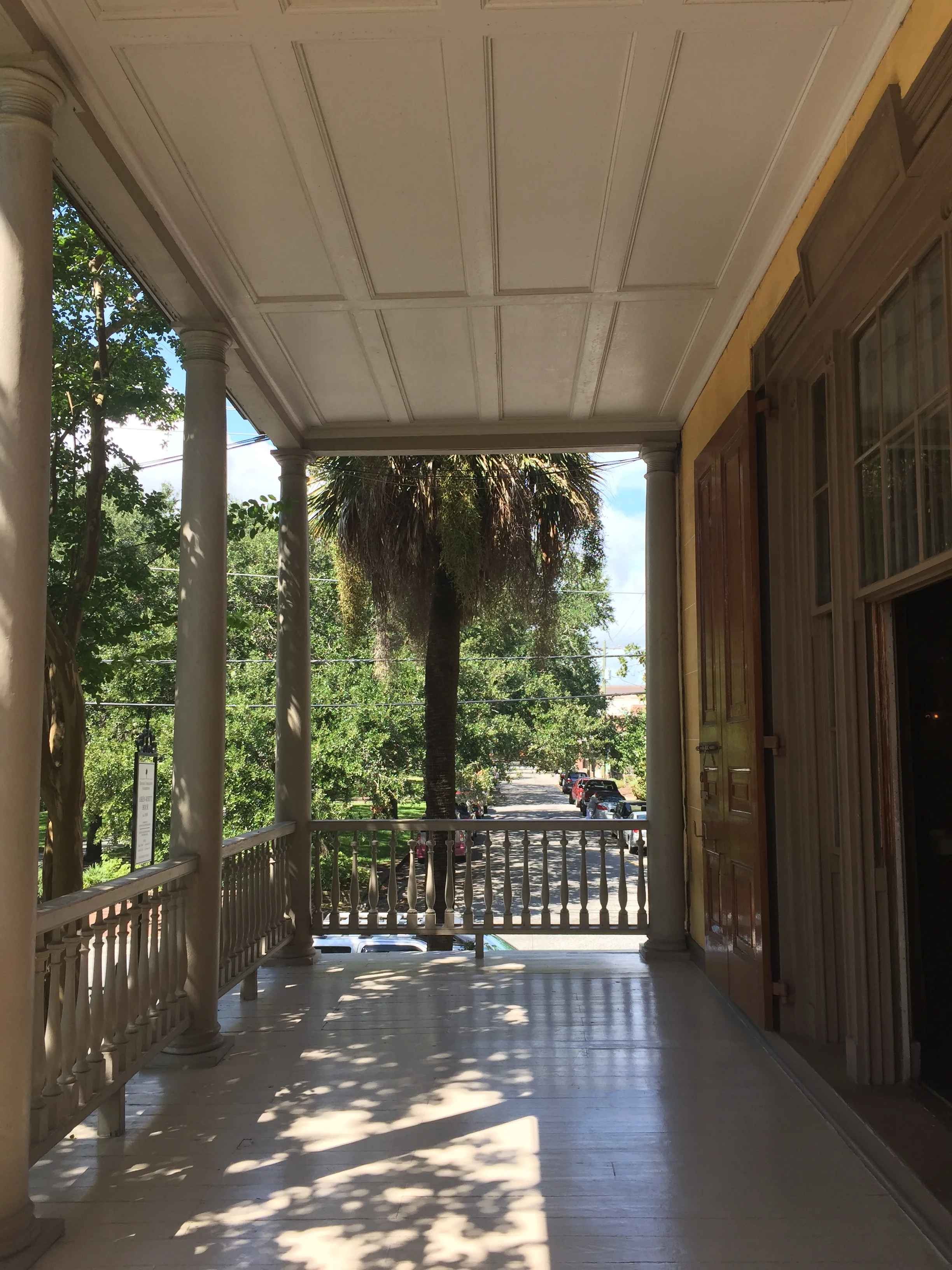 The columns of the porch are doric in character with turned baluster railings. The single hung windows transform into doorways that allow you to walk onto the verandahs. These windows are advantageously placed to allow for a cross breeze through the house and are extremely common in the South.