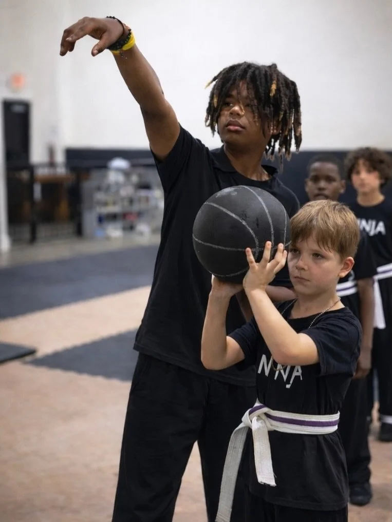 Leadership doesn&rsquo;t start at the front of the room. Sometimes it starts by standing next to someone who&rsquo;s just beginning.

Our Black Belt Path students help guide our Little Ninjas &mdash; learning patience, awareness, and responsibility t
