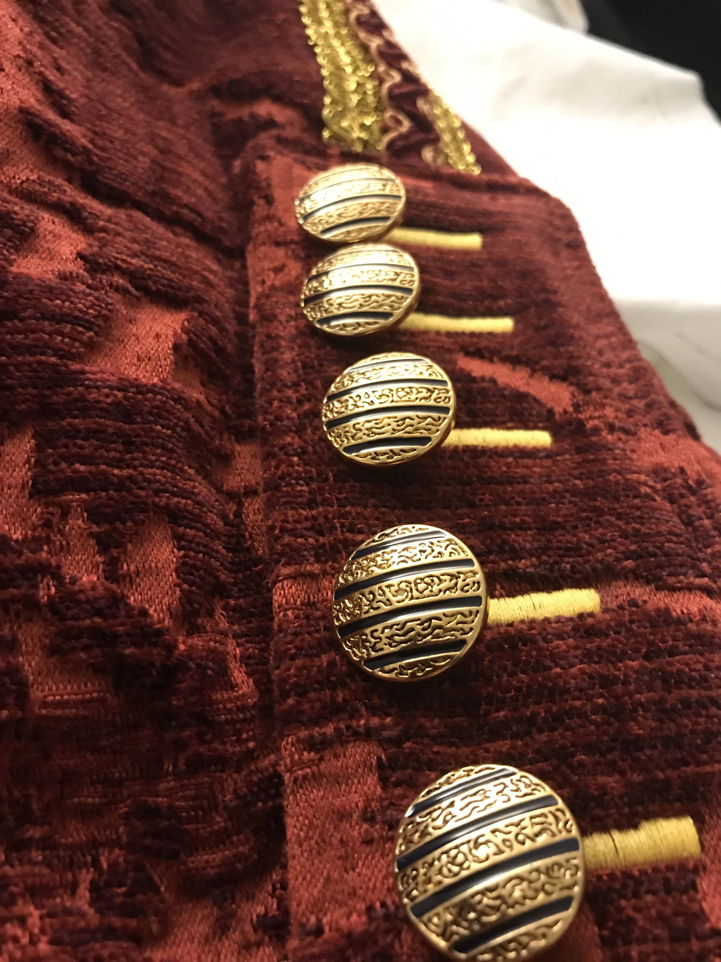 Metal and enamel buttons