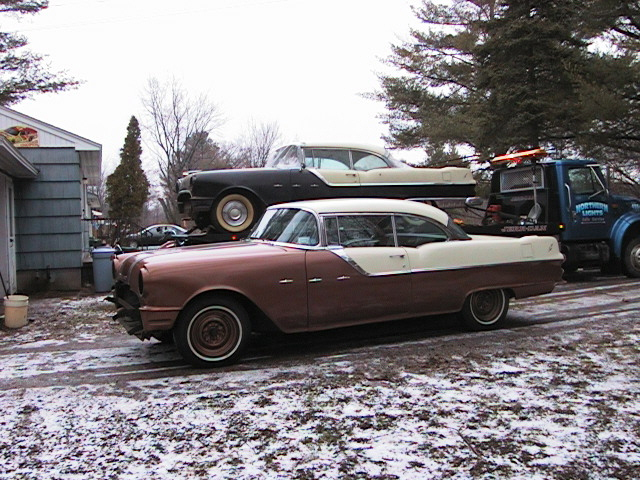 Seeing Double ? Terry Young arrives at our shop to drop off his car 1/15/2002 What other shop would give you a loaner so you don't miss your '55 ? Be a shame to leave his lift empty while we do up his car with limited space.