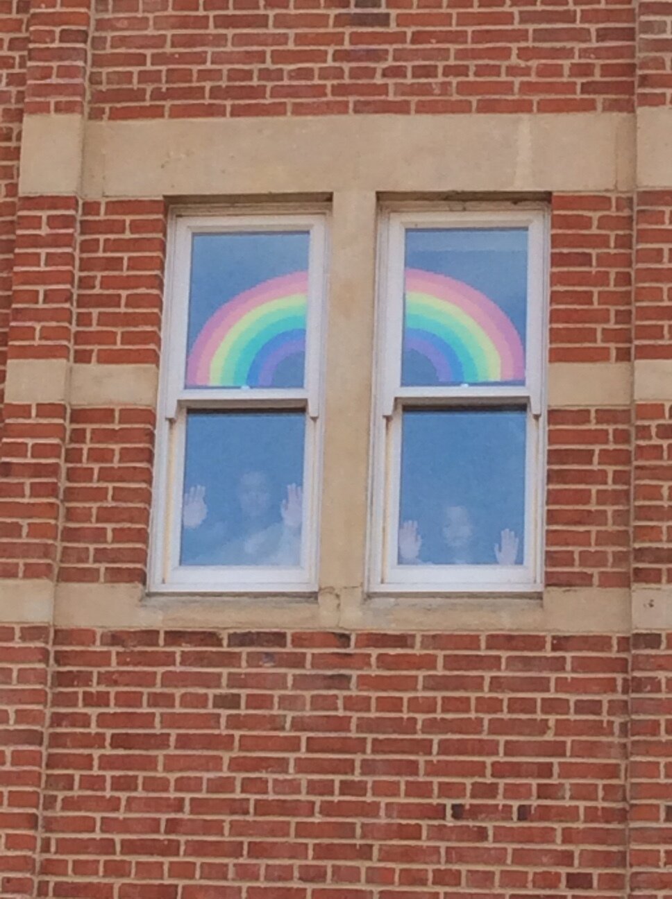 Doms rainbow in window.JPG