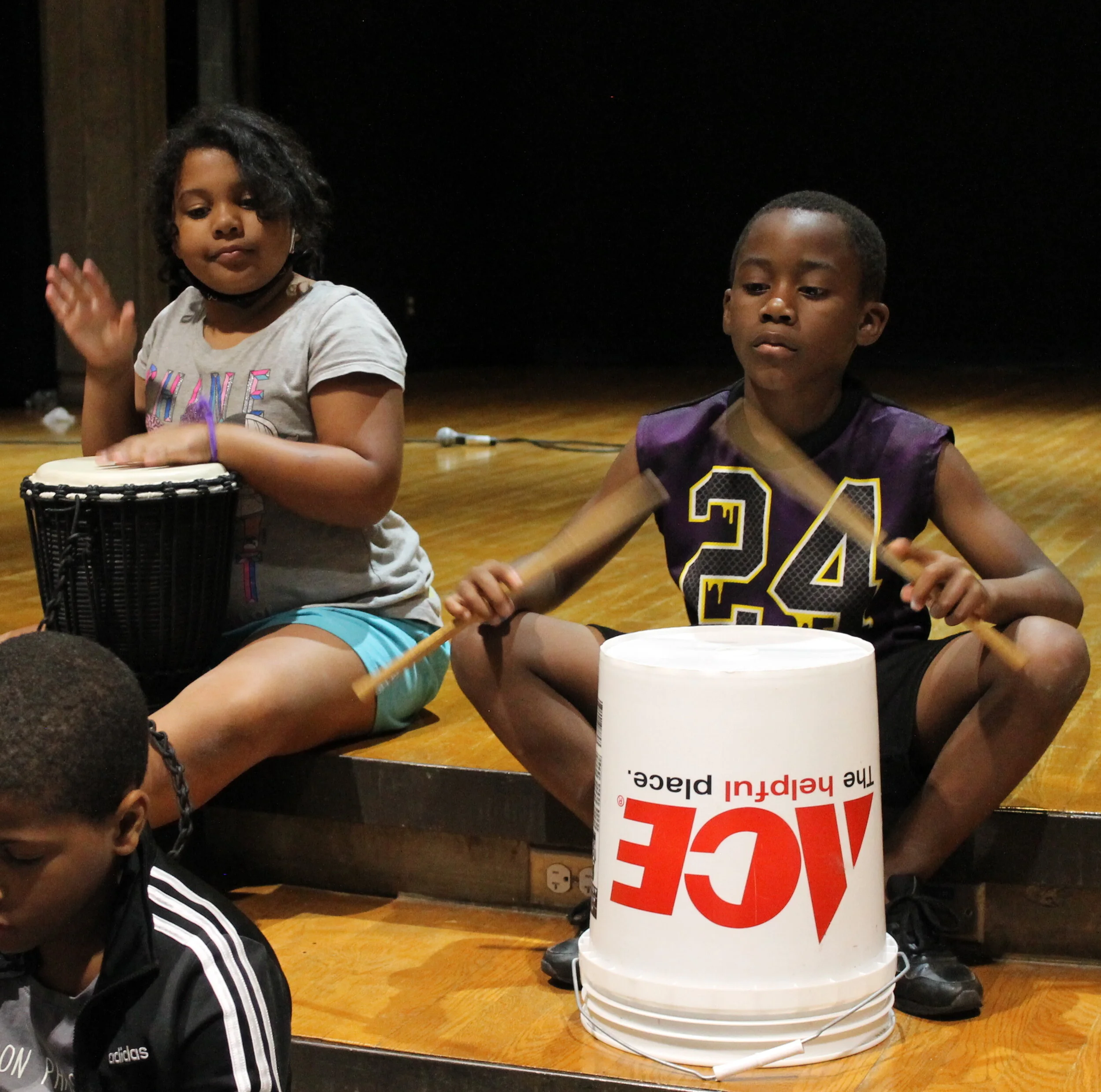 Franklin students practice their drumming skills.