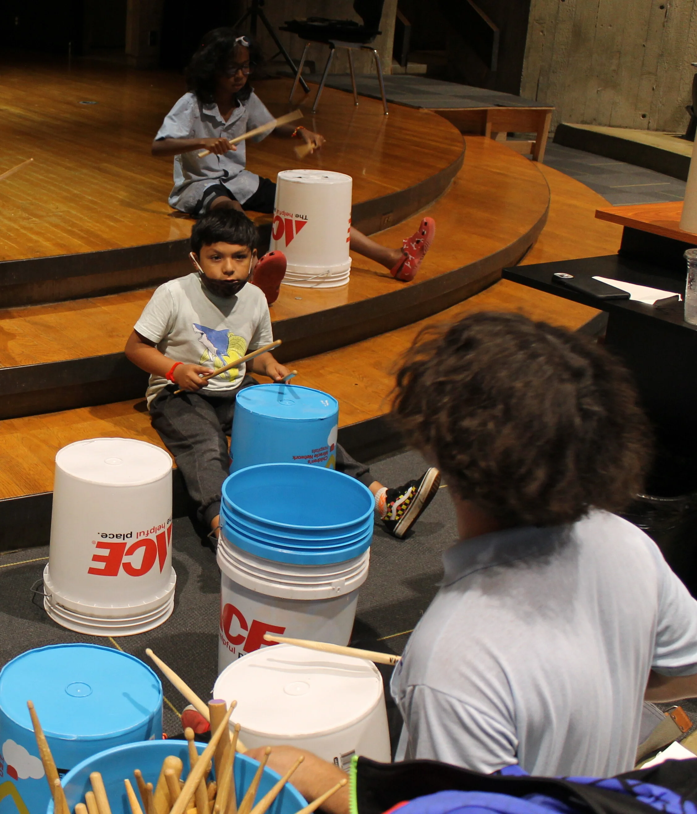 Instructor Shane Ellis leads students in a jam session.