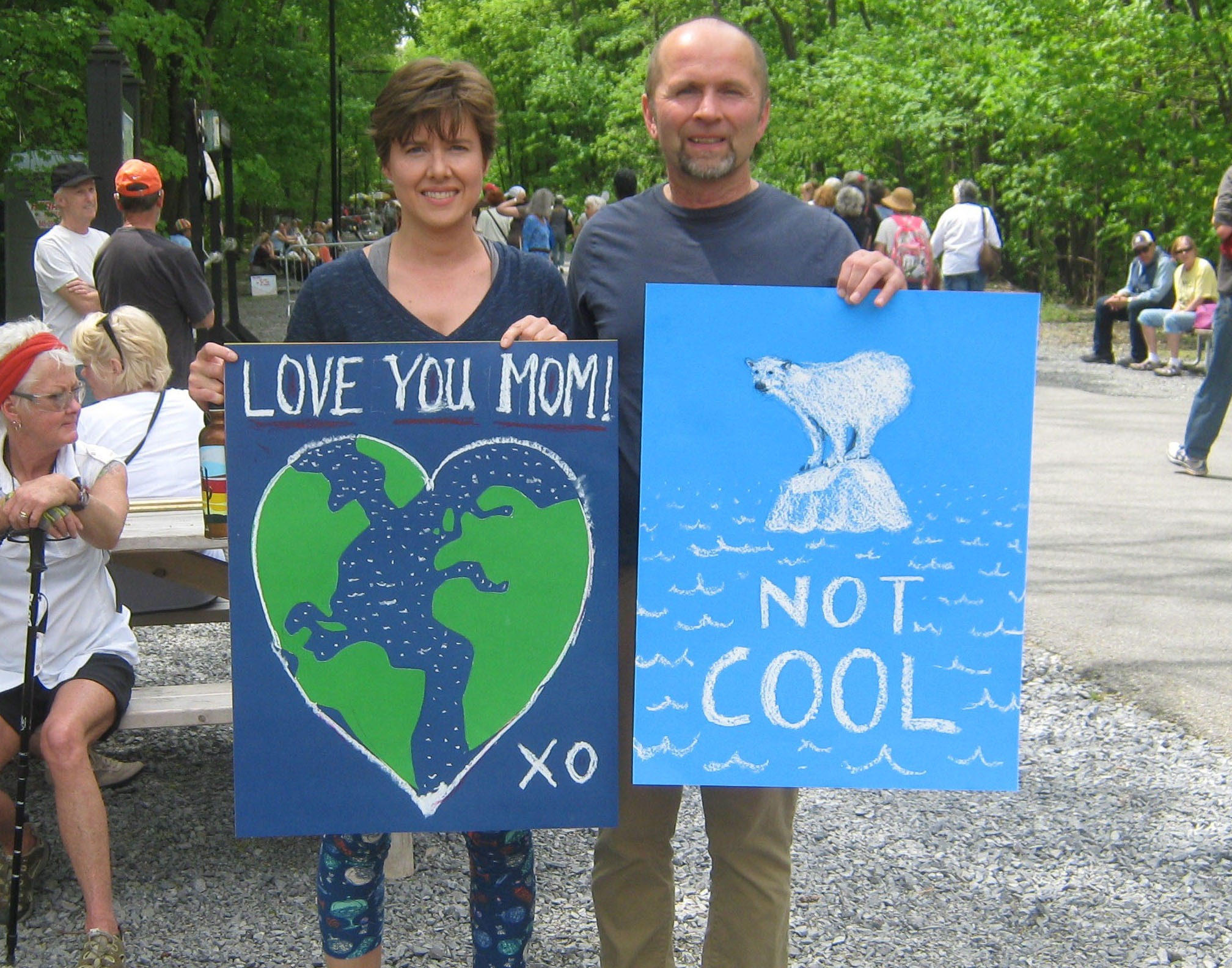 With hand-drawn signs, at the People's Climate March on the Walkway over the Hudson.