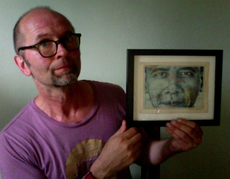 Holding my newly framed portrait of Barack Obama.