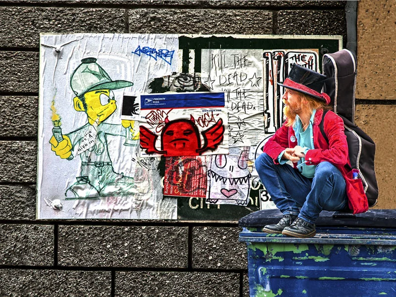 Man on Waste Bin - Bill Mammat