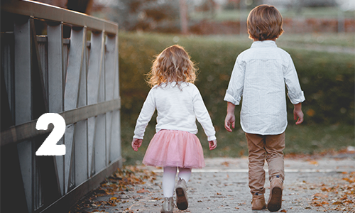 boy and girl on bridge.png