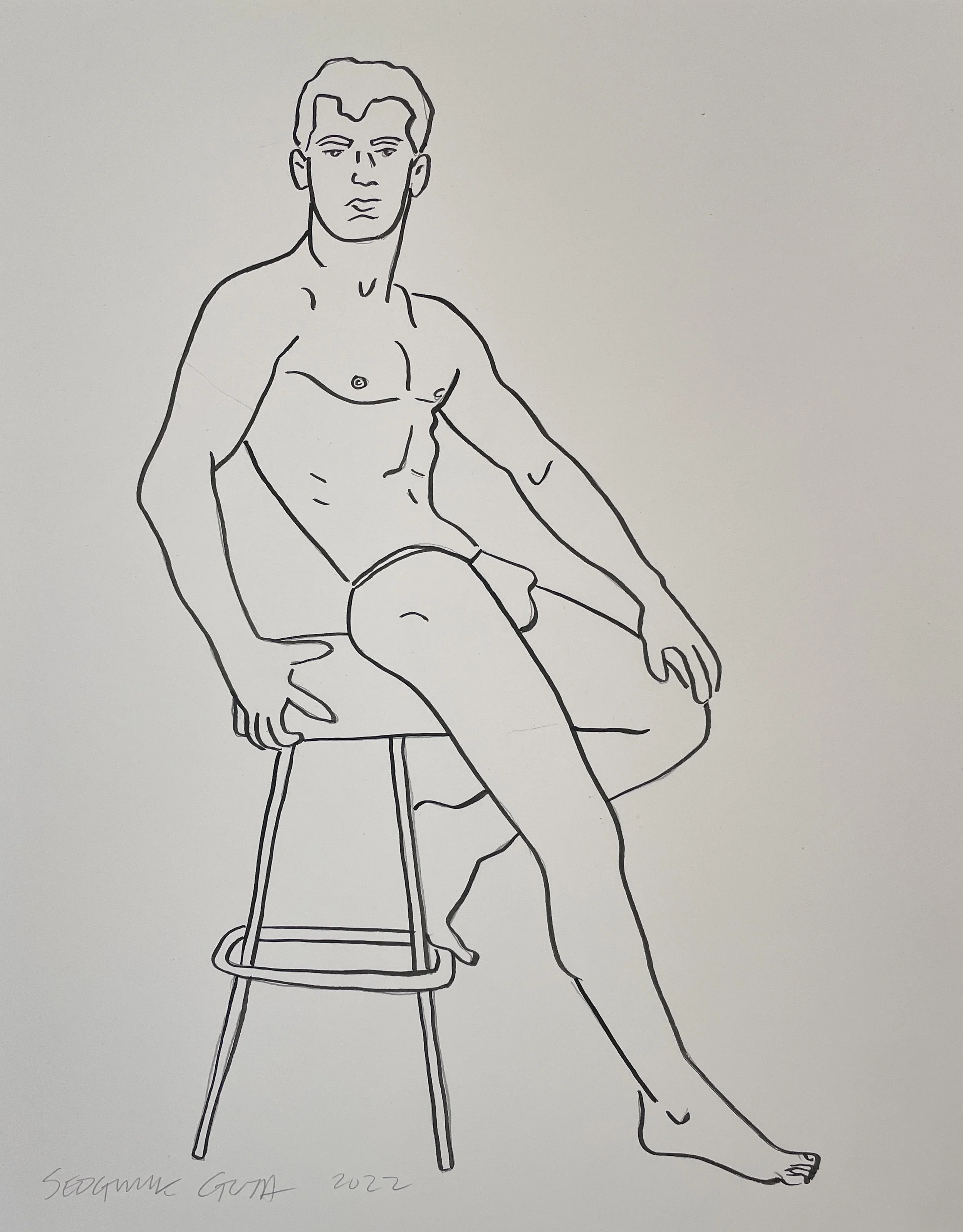 seated on a MCM stool.jpg