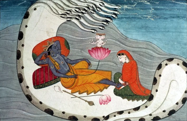 Vishnu (with his consort Lakshmi) sleeping on the serpent Adishesha, with Brahma meditating on a lotus growing out of Vishmu's navel, thus creating time