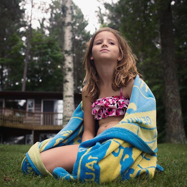 my clever niece, Arden, at the cabin this summer, wrapped in the legendary, signs of the zodiac circular towel.