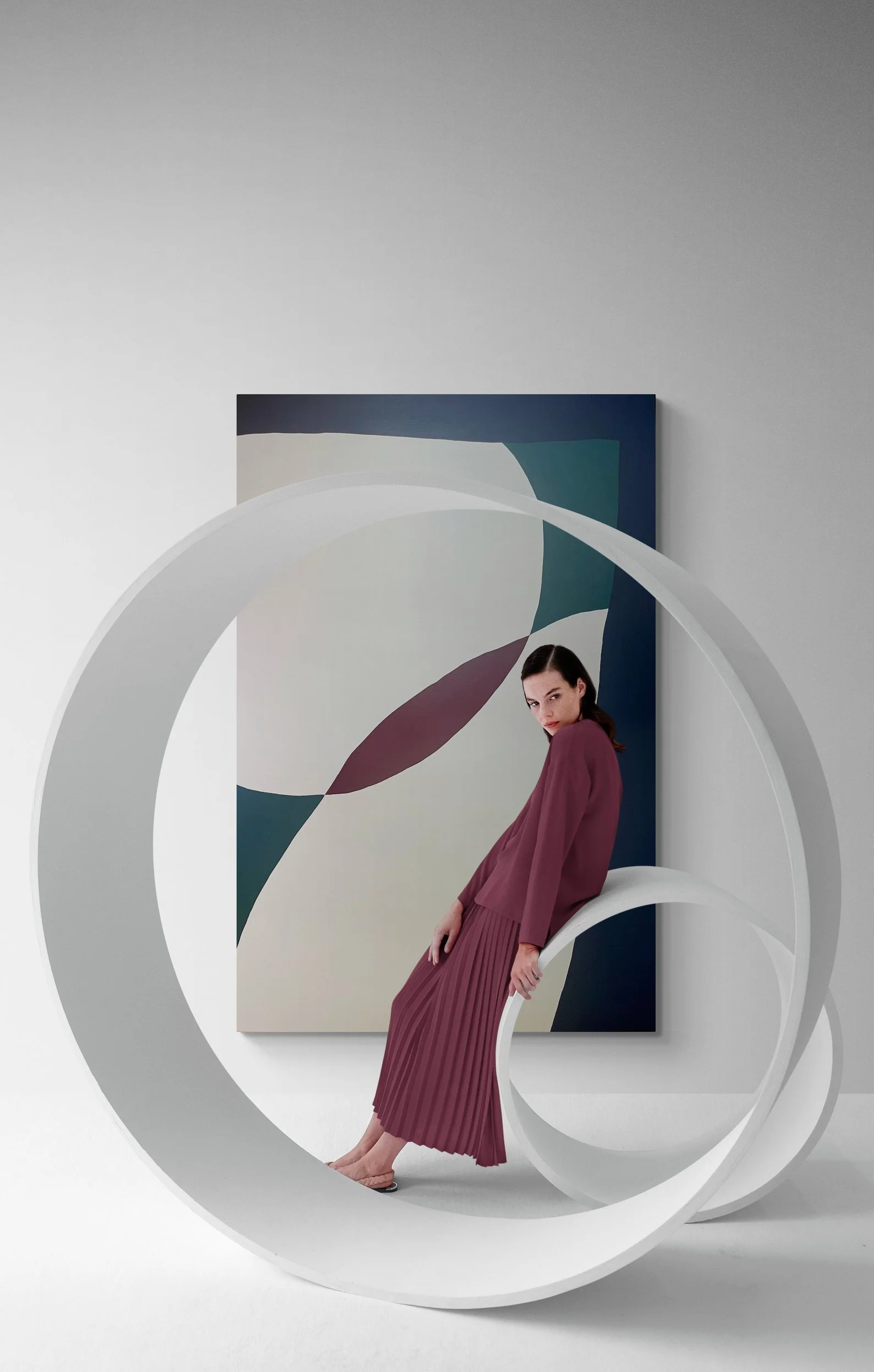 Young_woman_posing_with_sculptures+2 (1).jpeg