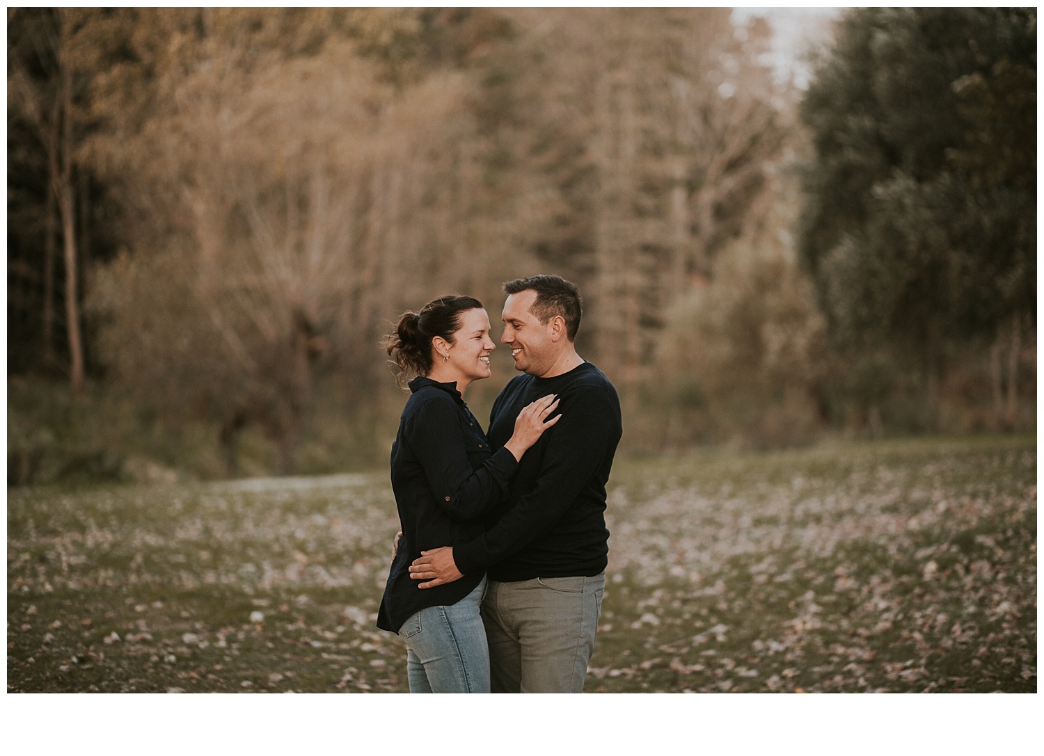 mother and father hugging family photography