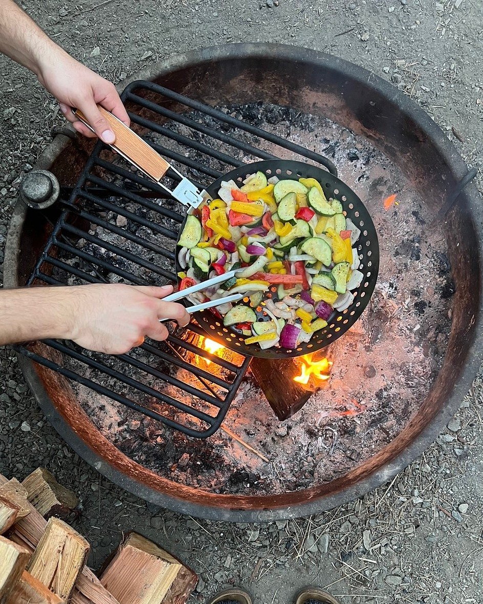 We love to see our campers cheffing it up 🧑&zwj;🍳 All tents come with a fire ring and grill for open fire cooking.  There&rsquo;s nothing better than cooking under the stars!

#coastalcampingtrip #camp #glamp #glamping #cooking #camping #cookingove