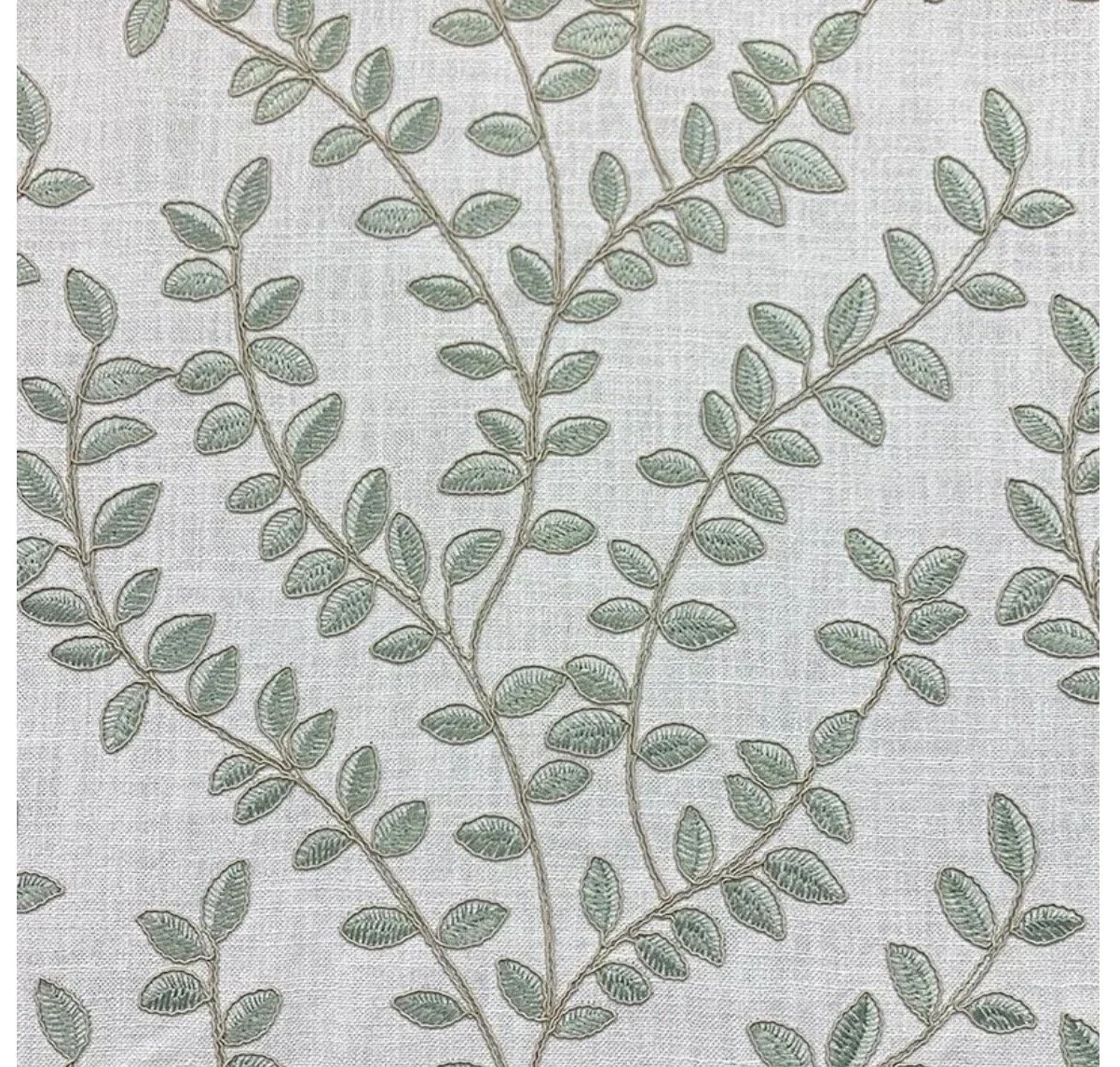 green embroidered fabric