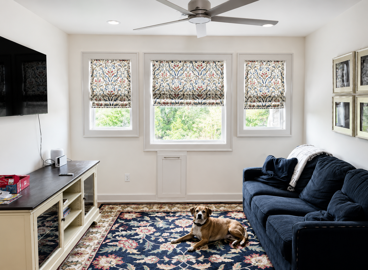 custom roman shades in a bedroom window