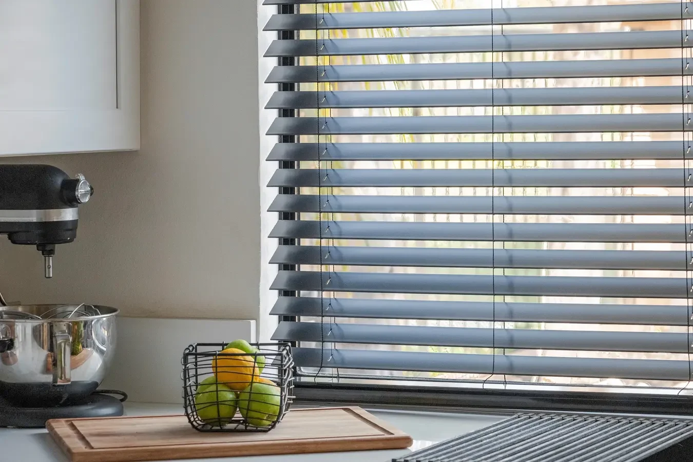 blinds installed in a window as a window treatment, custom blinds, roman blinds