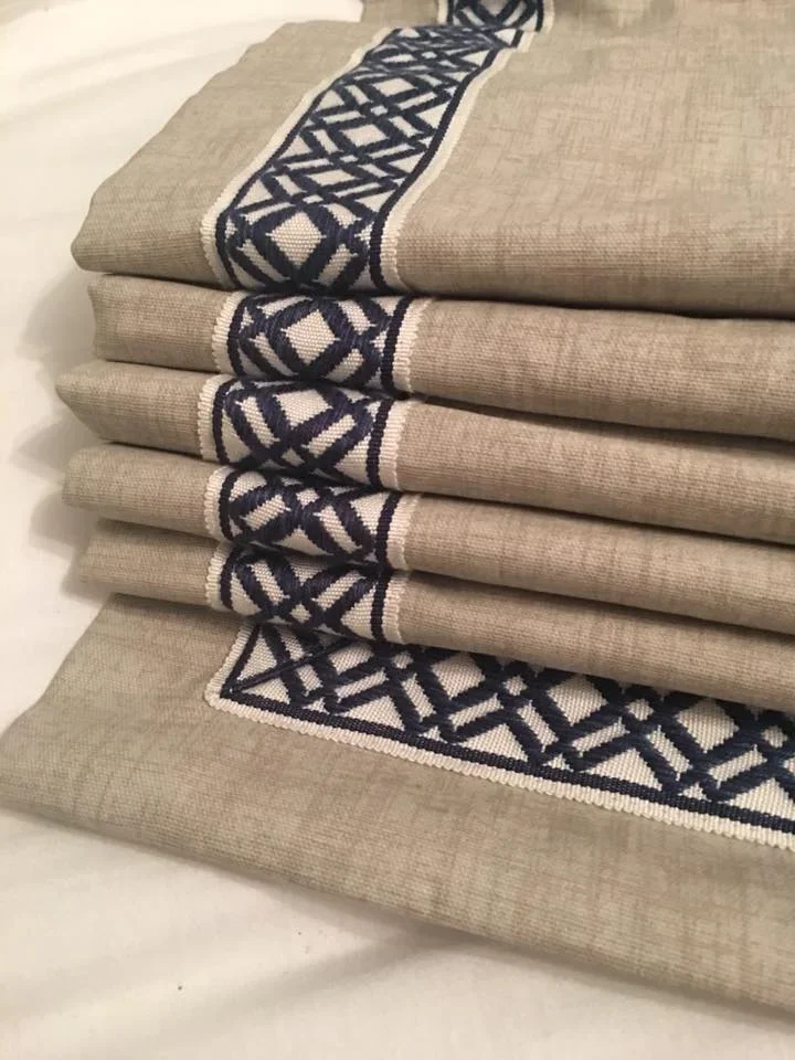 brown roman shade with ribbon trim